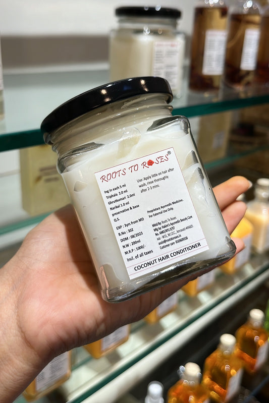 Roots To Roses hair mask texture showing creamy formula