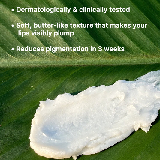 White cream on a green leaf with text about its properties
