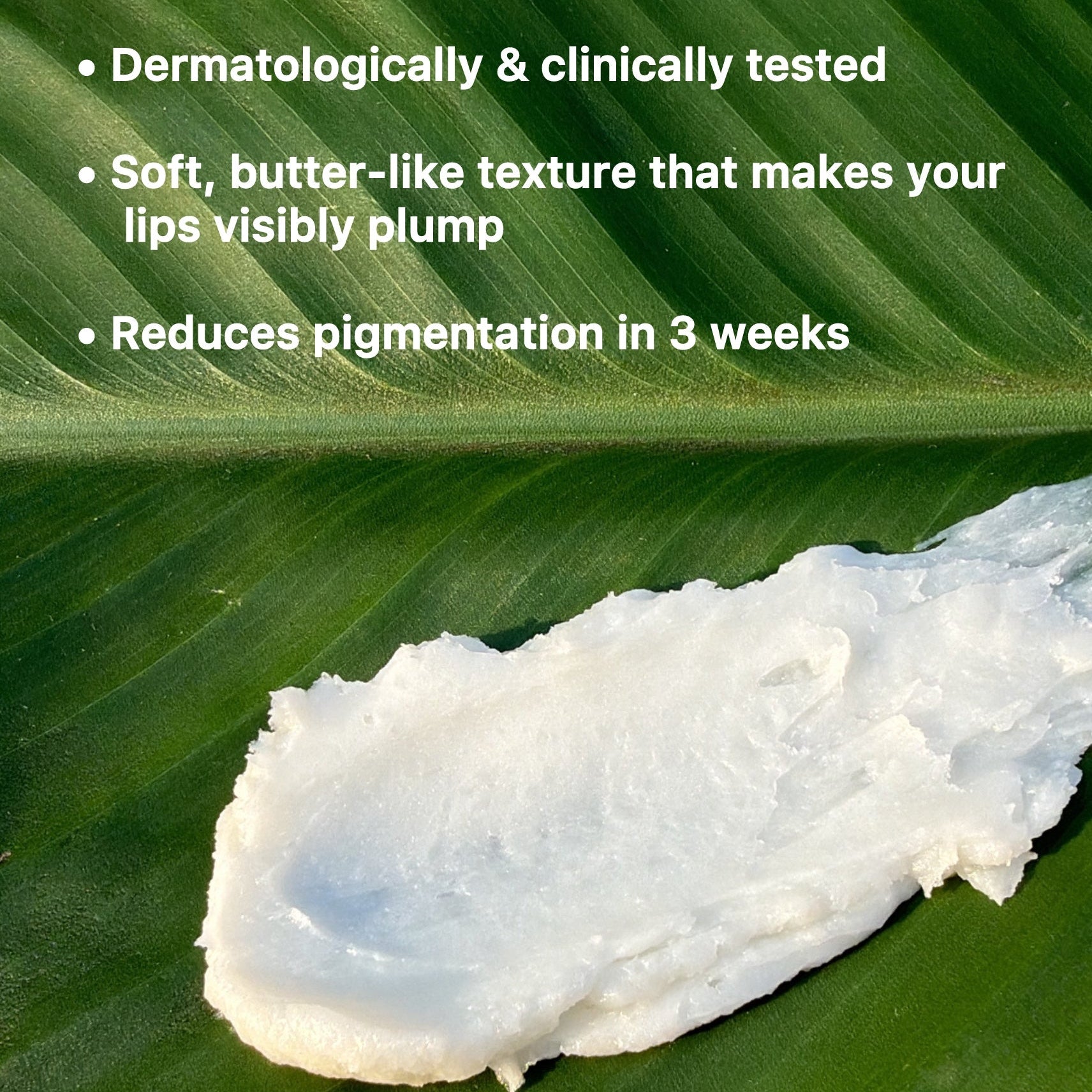 White cream on a green leaf with text about its properties